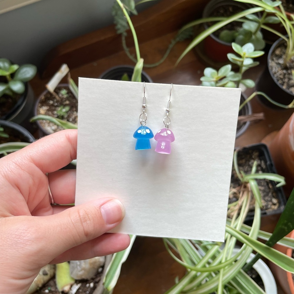 Blue and purple glow in the dark mushroom earrings 🍄